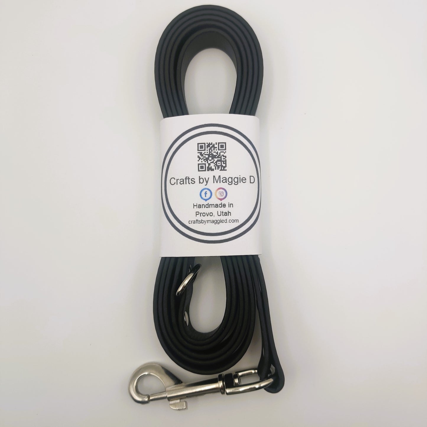 Black BioThane dog leash with silver hardware