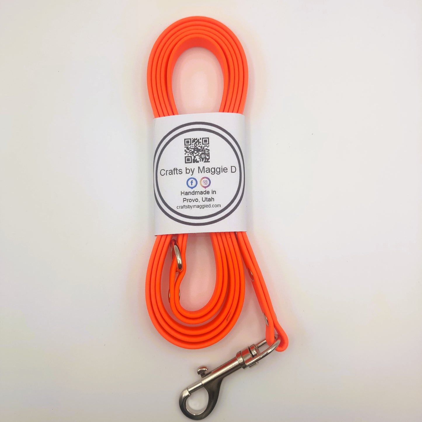 Orange BioThane dog leash with silver hardware